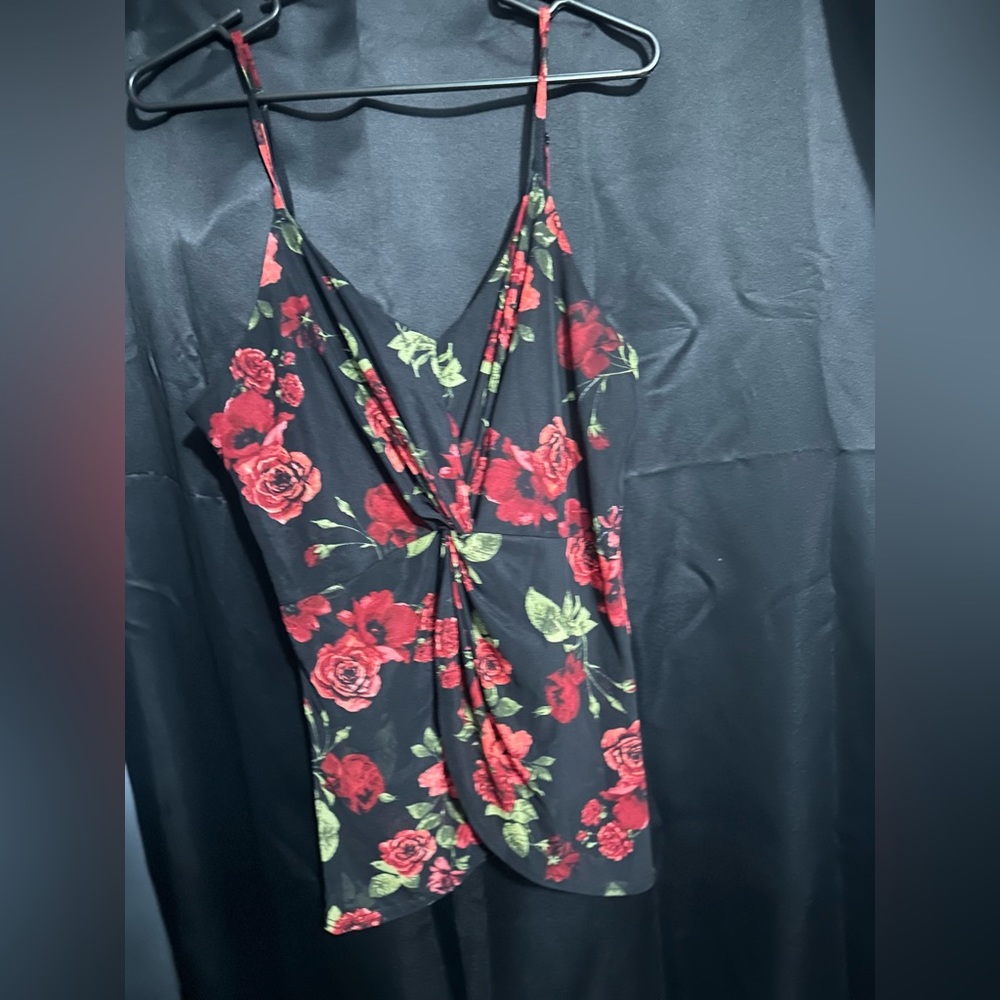 Black shirt with roses.